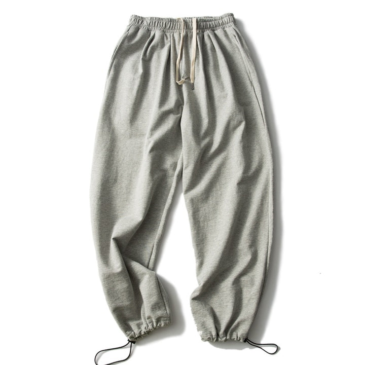 Unisex Relaxed-Fit Jogging Pants with elastic waistband, drawstring, and adjustable hem