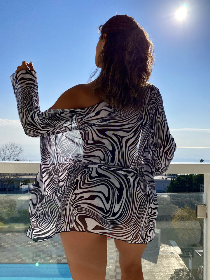 Women's lightweight beach dress with asymmetrical cut and stylish pattern Mune Fashion