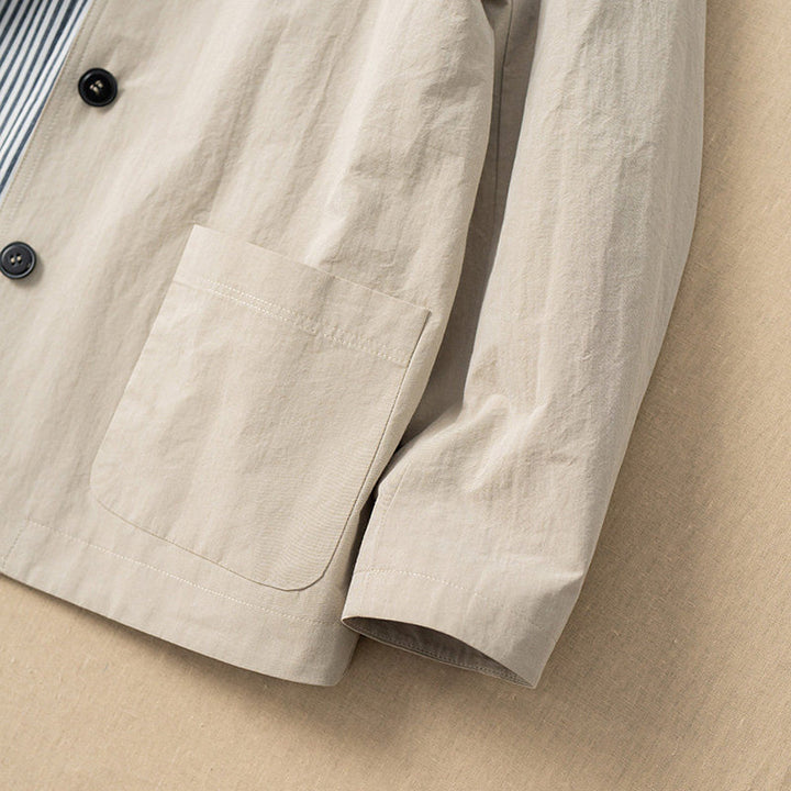 Ladies Fashionable Transitional Jacket with Unique Button Placket Mune Fashion