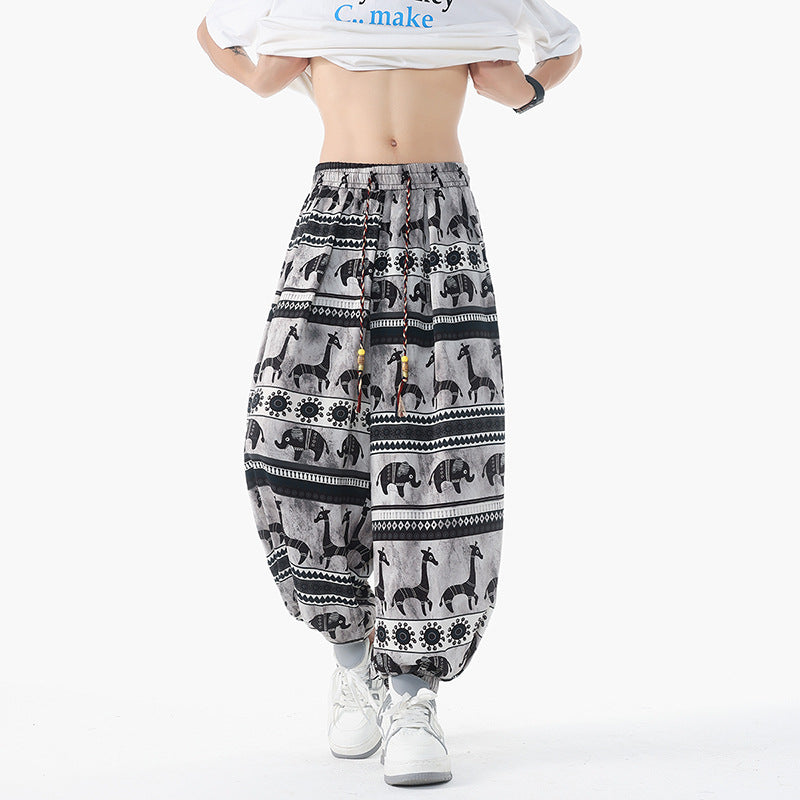 Women's casual pluder pants in ethnic print with elastic waistband, drawstring and smocked cuffs Mune Fashion