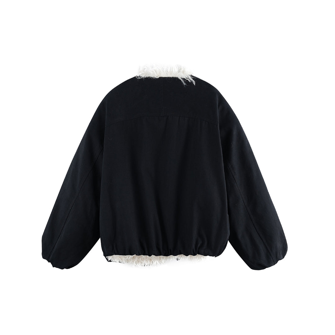 Women's short jacket in oversized cut with voluminous teddy lining and elastic hem