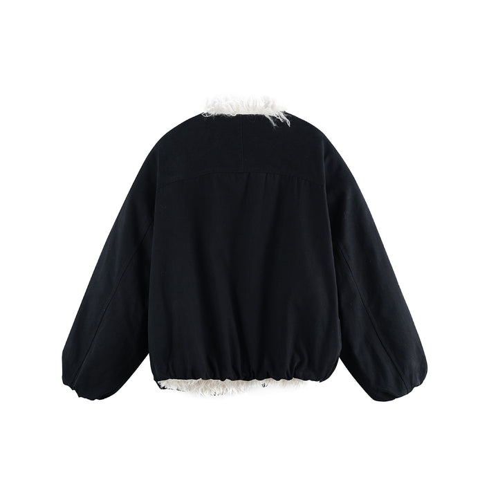 Women's short jacket in oversized cut with voluminous teddy lining and elastic hem
