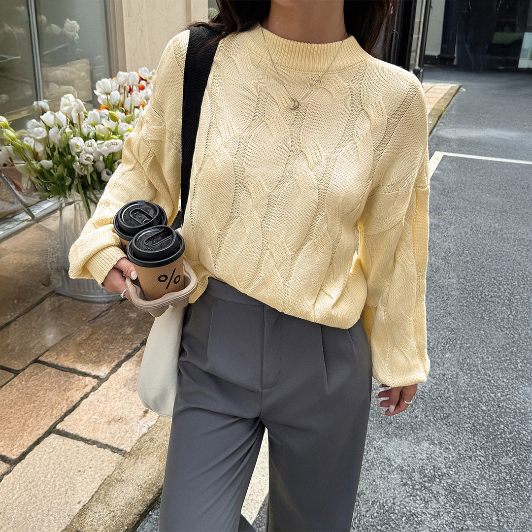 Women's cropped cable knit sweater with boxy silhouette, dropped shoulder, and ribbed hem Mune Fashion