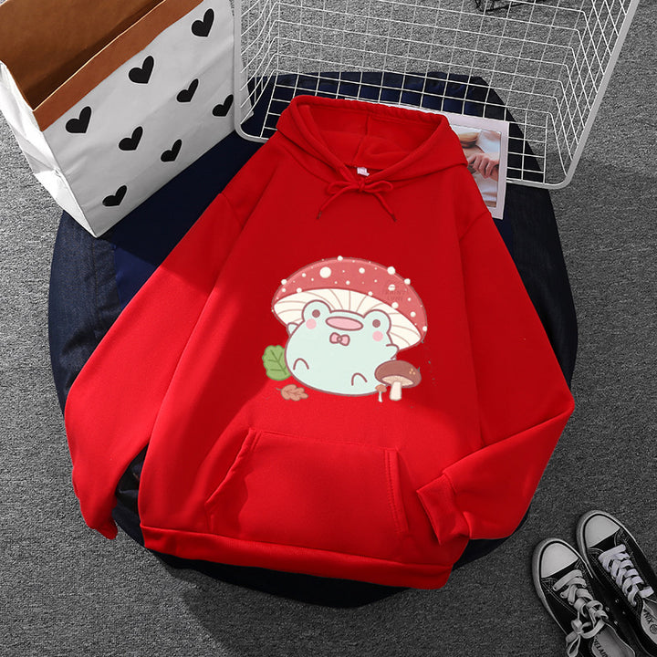 Women’s soft oversized hoodie with kawaii mushroom frog print, kangaroo pocket, and ribbed cuffs Mune Fashion