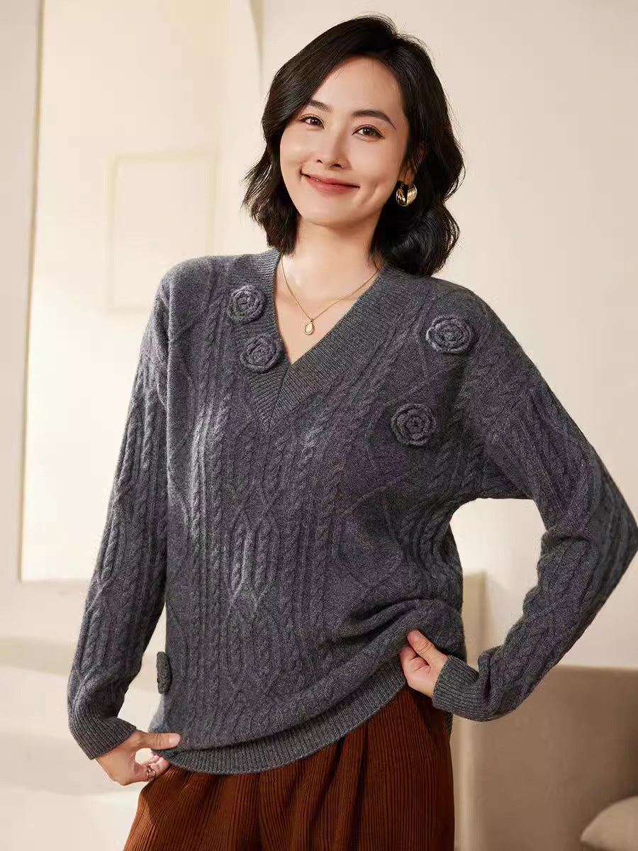 Women's cable knit V-neck sweater with three-dimensional floral appliqués made from soft wool blend Mune Fashion