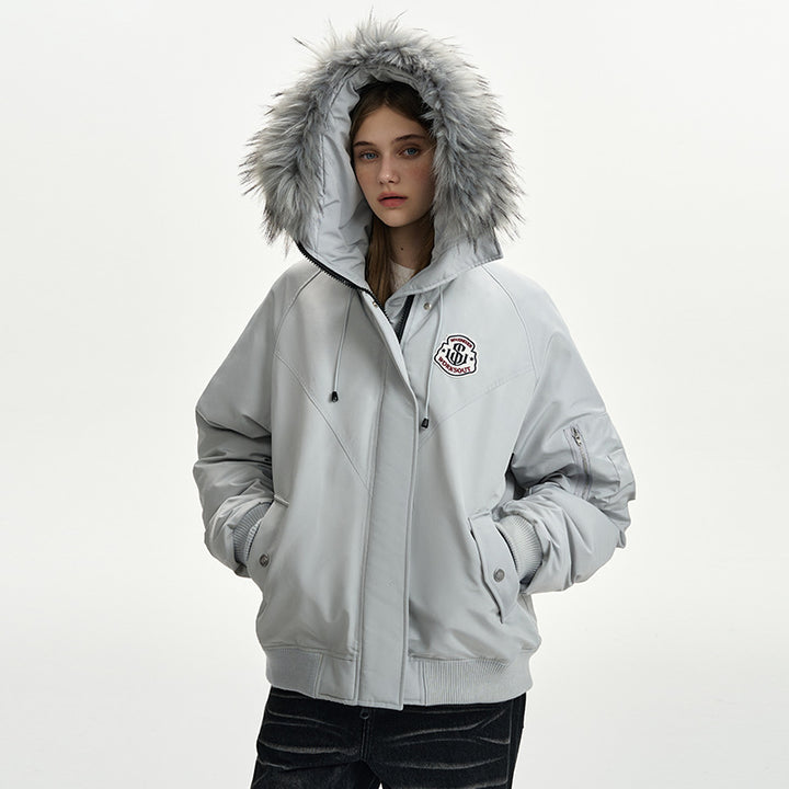 Women’s oversized thermo parka with voluminous hood, detachable faux fur trim and ribbed cuffs Mune Fashion