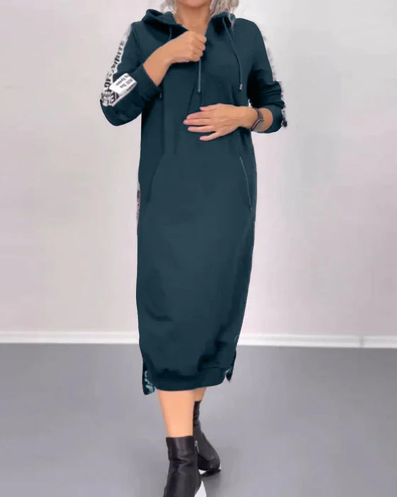 Women's ankle-length hooded sweatshirt dress with half zip, kangaroo pockets and side decorative piping Mune Fashion