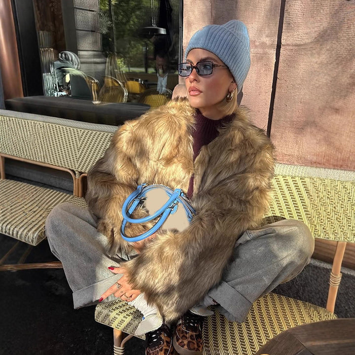 Women's short faux fur jacket with oversized sleeves and plush collar Mune Fashion