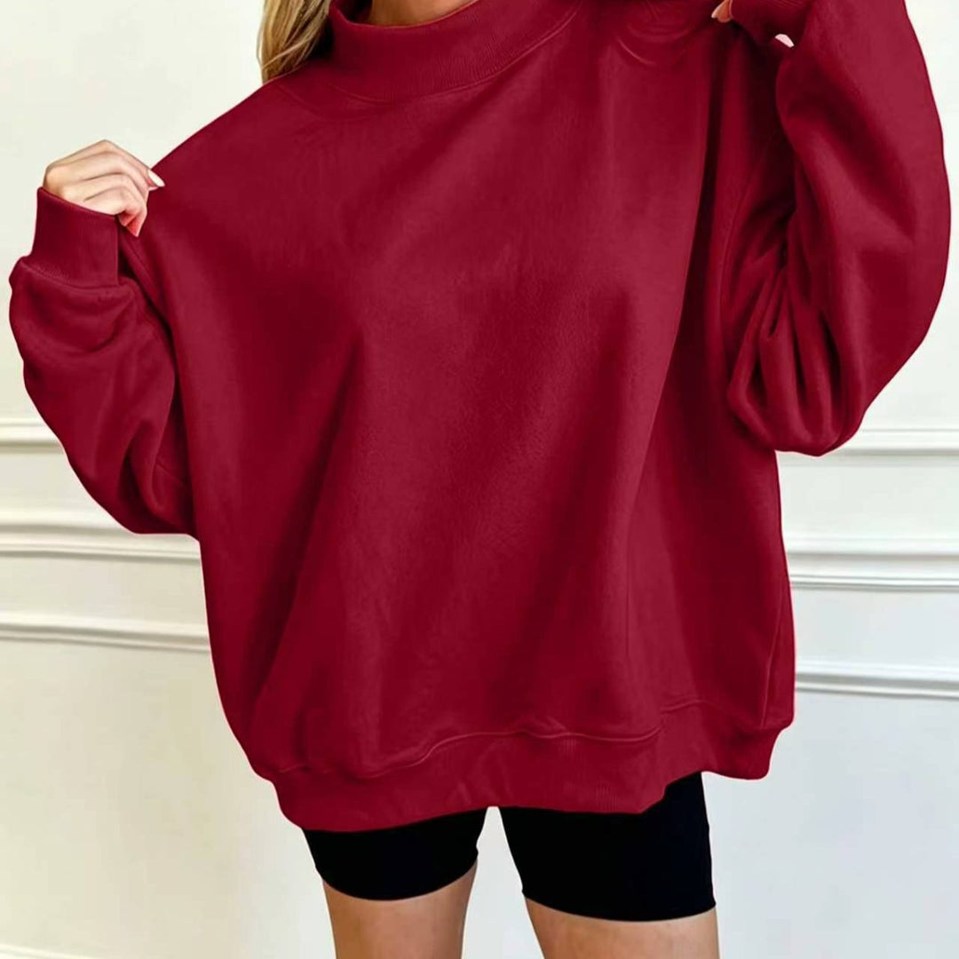 Women's Oversize Sweatshirt with Stand-Up Collar and Balloon Sleeves Mune Fashion
