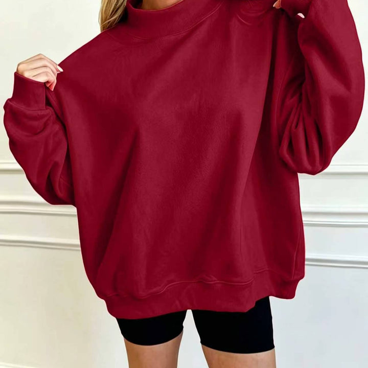 Women's Oversize Sweatshirt with Stand-Up Collar and Balloon Sleeves Mune Fashion