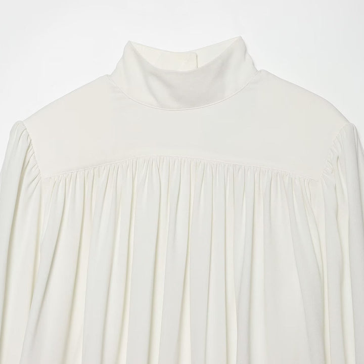 Ladies' blouse with high roll neck, gathered front and bow sleeves Mune Fashion