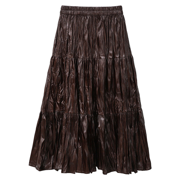 Women's tiered maxi skirt in coated crinkle material with elastic comfort waistband Mune Fashion
