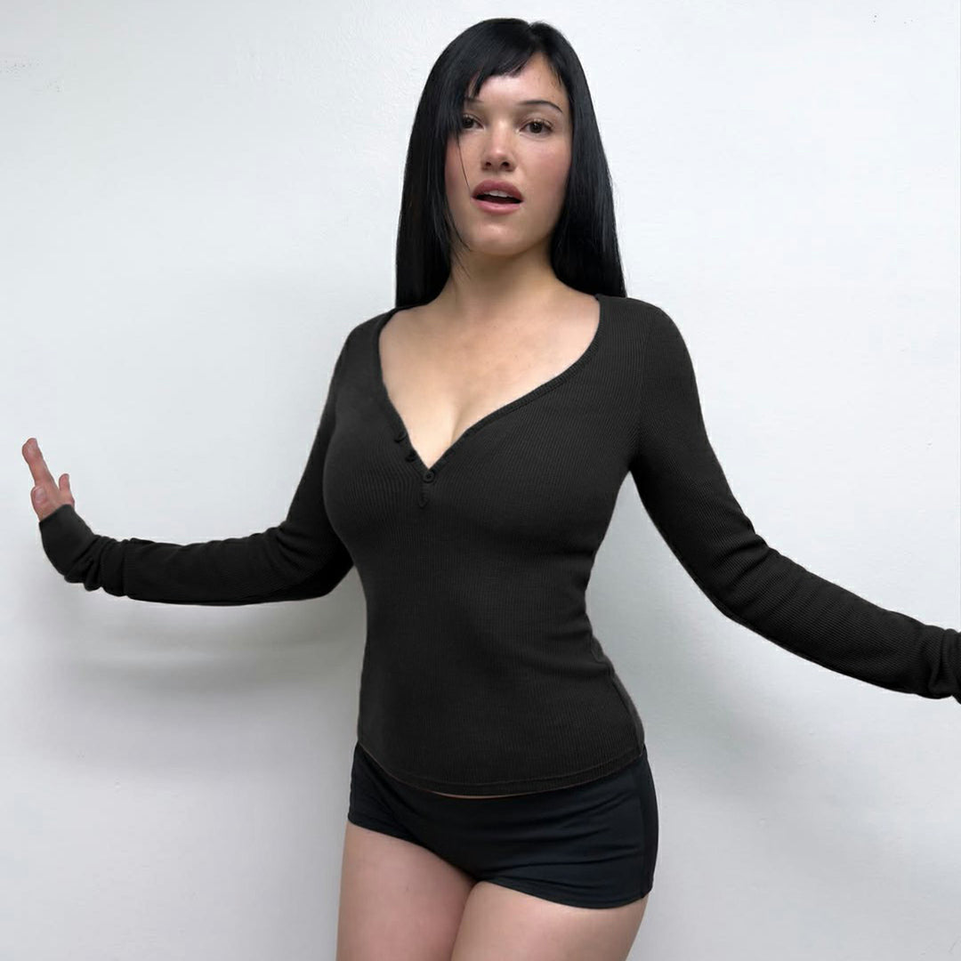 Women's form-fitting ribbed long sleeve Henley top with deep V-neck and button placket Mune Fashion