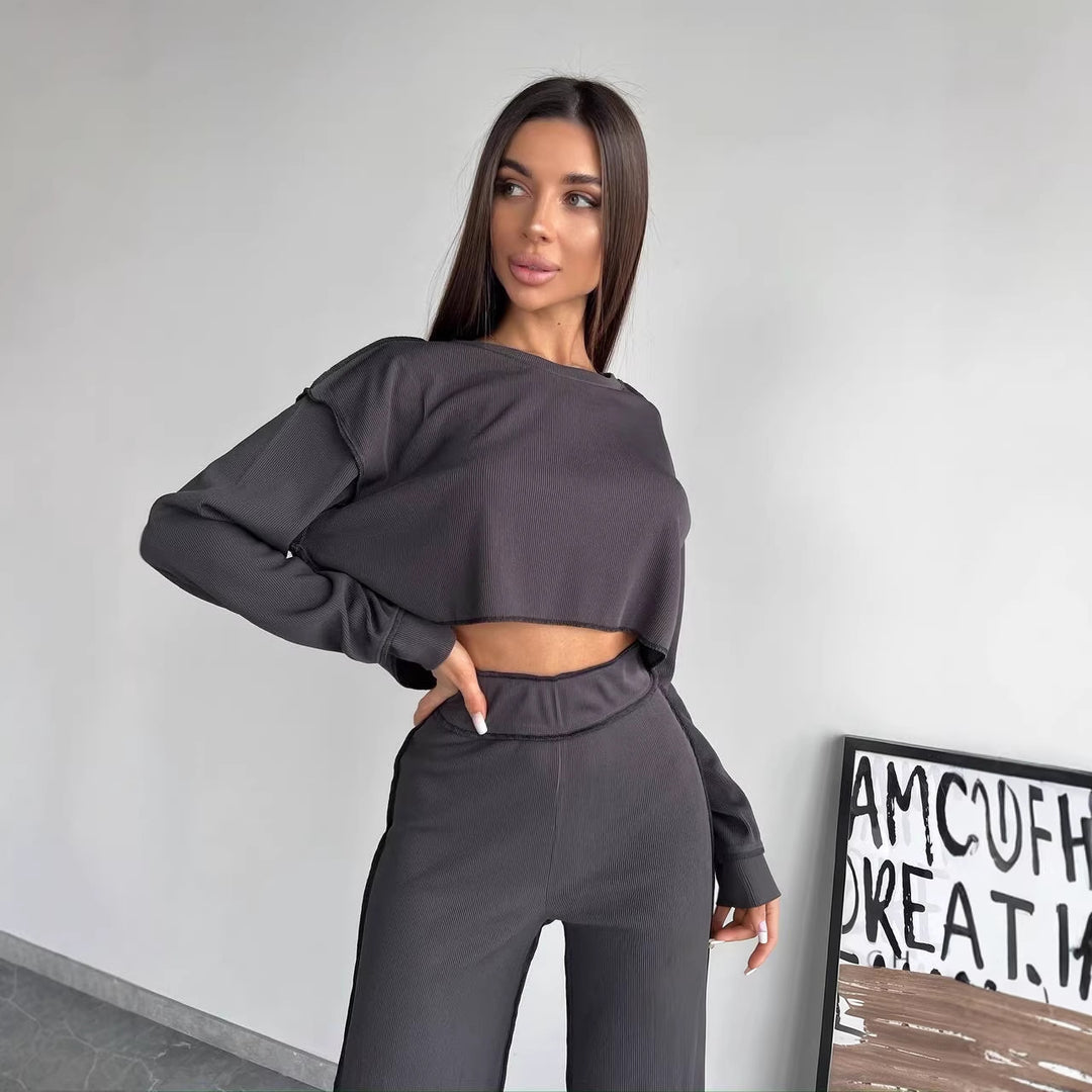 Women Cropped Oversized Sweatshirt with Overlock Seams and High-Waist Flared Pants Set Mune Fashion
