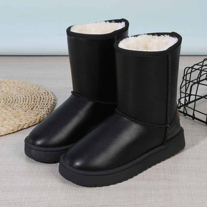 Women's winter boots with teddy lining, leather look and flat platform sole Mune Fashion