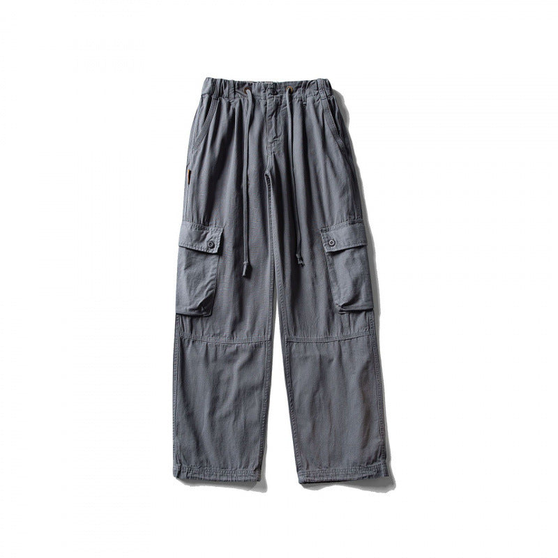 Men's cargo pants with wide leg, elastic drawstring waistband, and patch flap pockets Mune Fashion