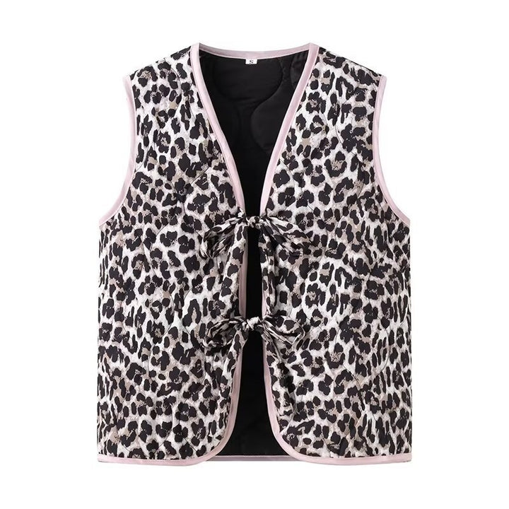 Ladies nan lightweight quilted reversible vest with leopard print, contrast piping, and double bow closure Mune Fashion