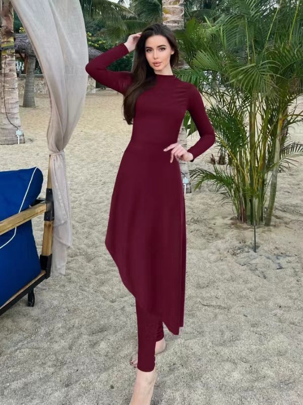 Ladies elegant beach suit with asymmetrical cut and long sleeves Mune Fashion