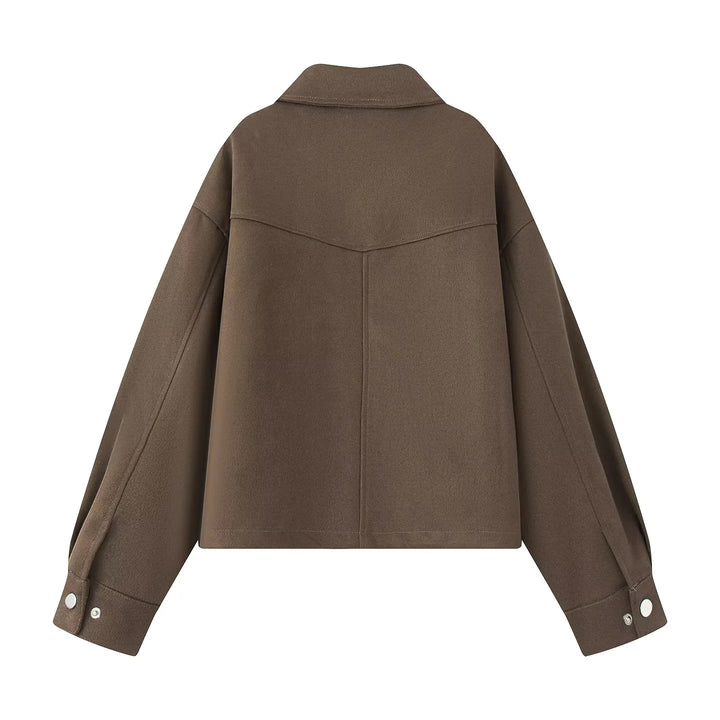 Women's boxy short utility jacket with large flap pockets, snap button placket, and drop shoulder Mune Fashion