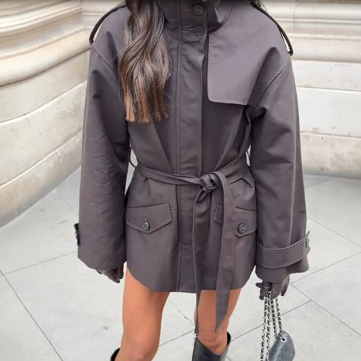 Women's Short Tailored Trench Jacket with Stand-Up Collar, Flap Pockets and Tie Belt Mune Fashion