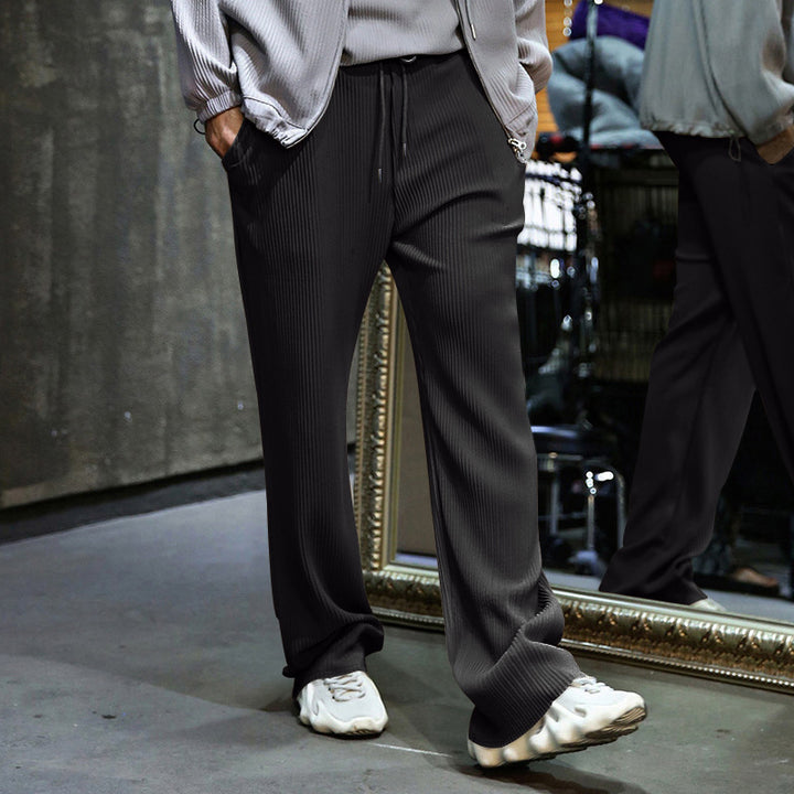 Men's loosely cut pleated trousers with drawstring and wide leg Mune Fashion