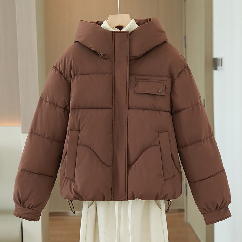 Women's short padded hooded jacket with concealed front placket, chest patch pocket and adjustable drawstring hem Mune Fashion