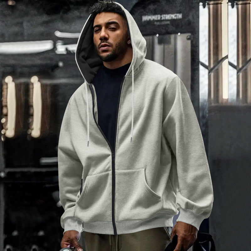 Men's oversized zip-up hoodie with kangaroo pockets and contrasting inner lining Mune Fashion