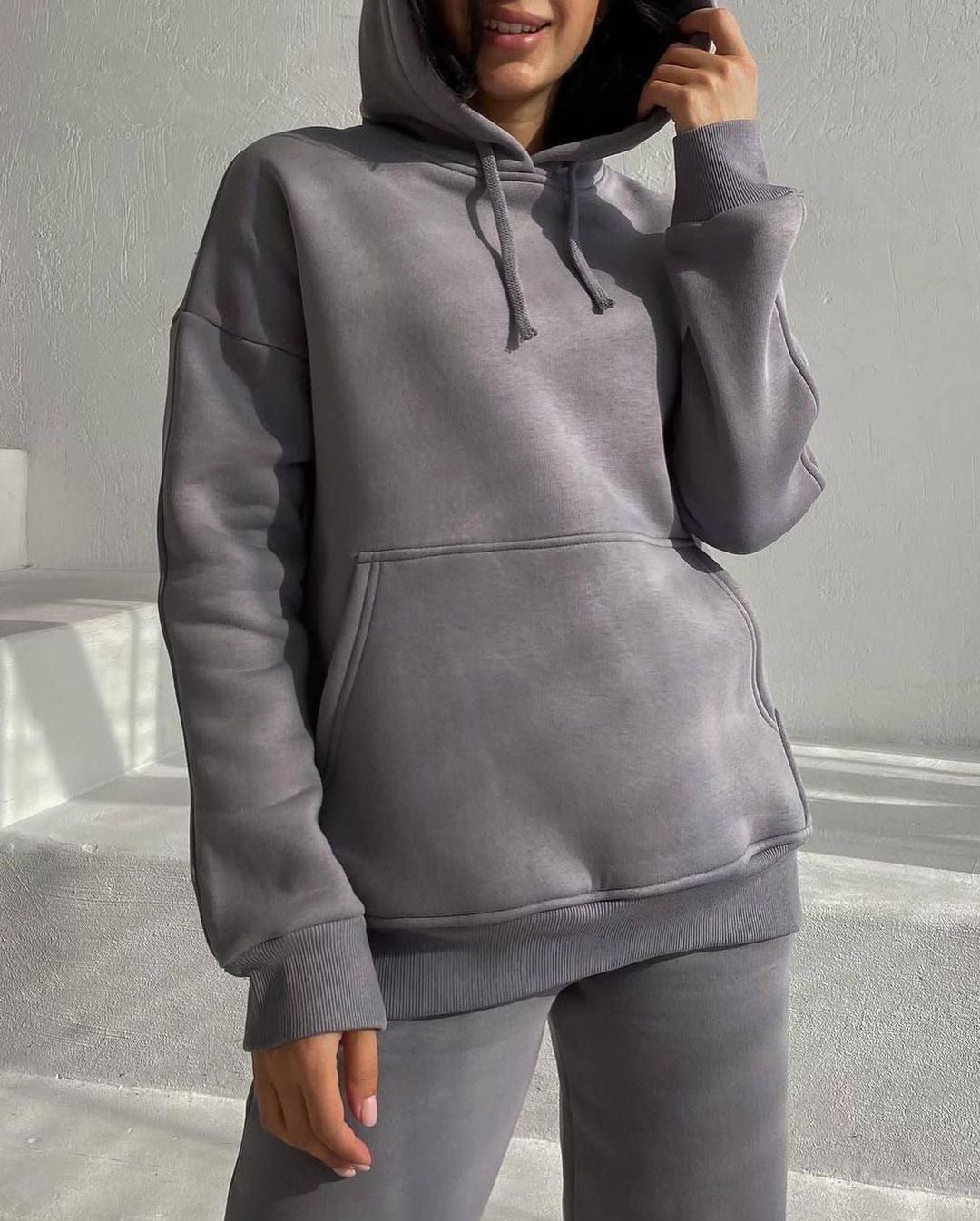 Women's Oversize Loungewear Set made of soft cotton blend fleece with hoodie and tapered jogging pants Mune Fashion