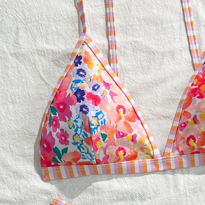 Women's triangle bikini set with floral pattern and playful design Mune Fashion