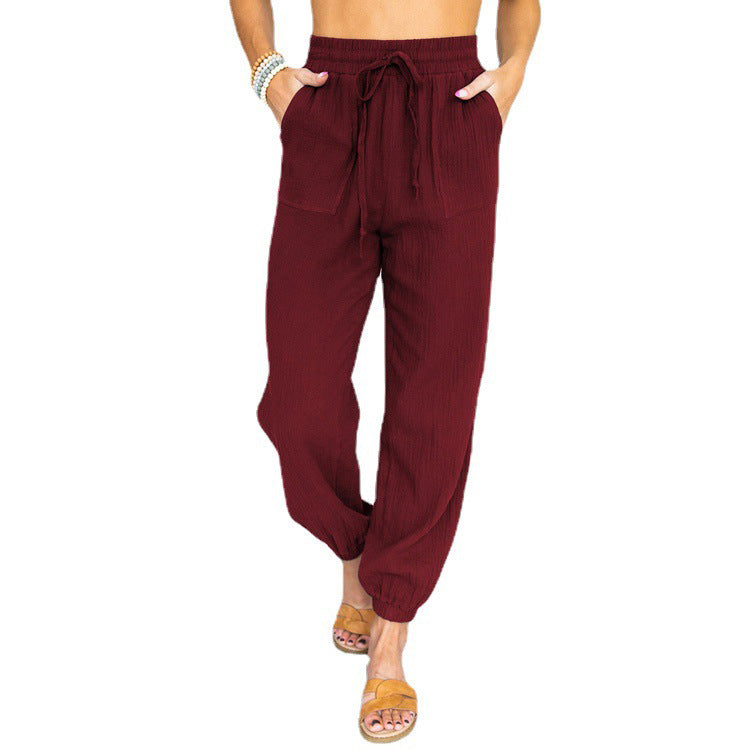 Women nan light linen look casual pants with high elastic waistband, drawstring, patched pockets and elastic ankle cuffs Mune Fashion