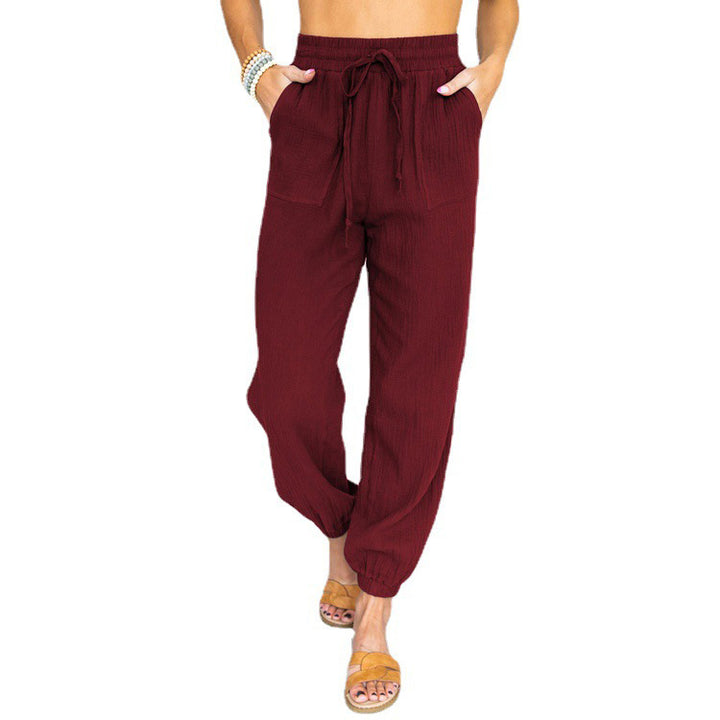 Women nan light linen look casual pants with high elastic waistband, drawstring, patched pockets and elastic ankle cuffs Mune Fashion