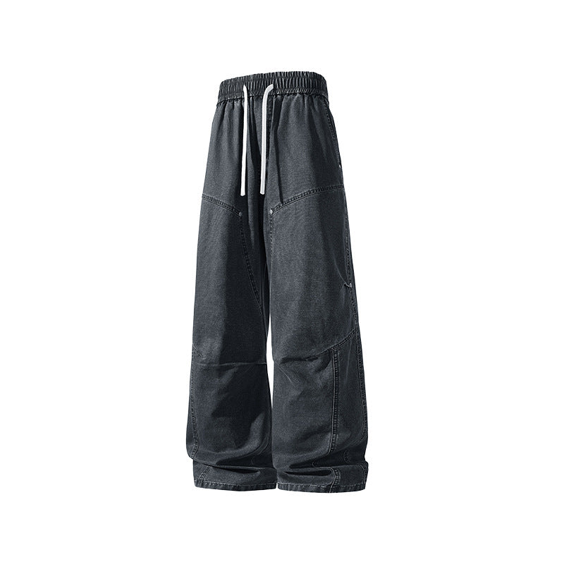 Men's wide baggy cargo pants made of washed canvas with elastic waistband and decorative stitching panels Drune