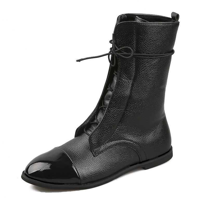 Women's elegant lace-up ankle boots with patent toe cap detail, textured upper material and slim flat sole Mune Fashion