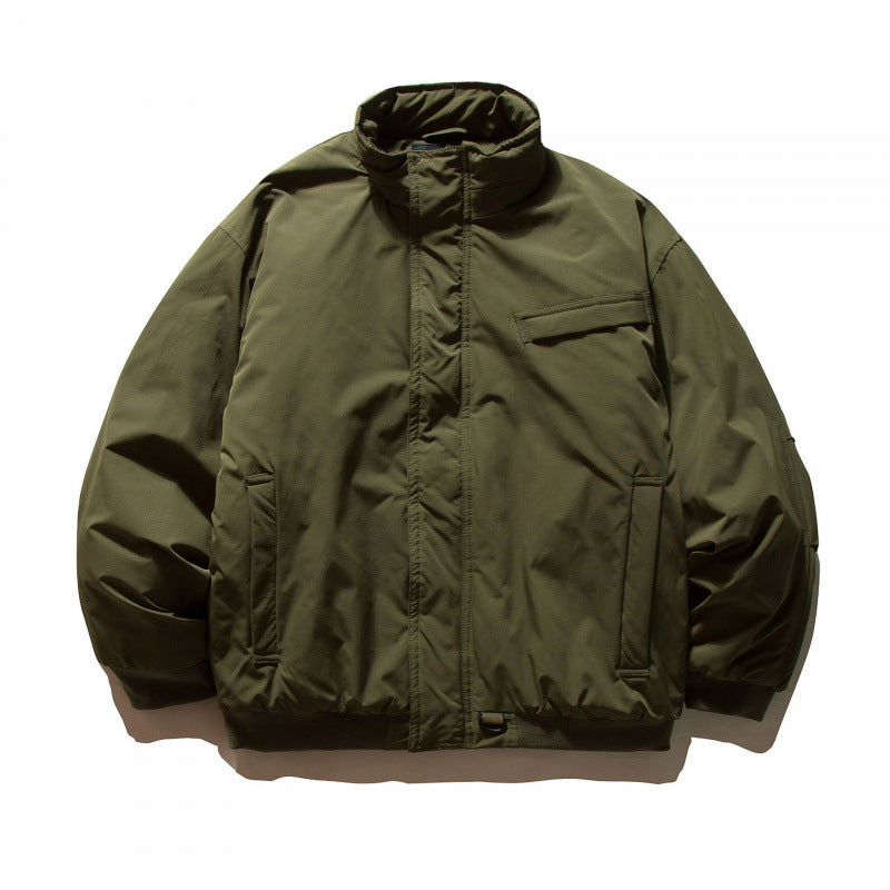 Unisex Boxy-padded transition jacket with high stand-up collar and utility pockets Mune Fashion