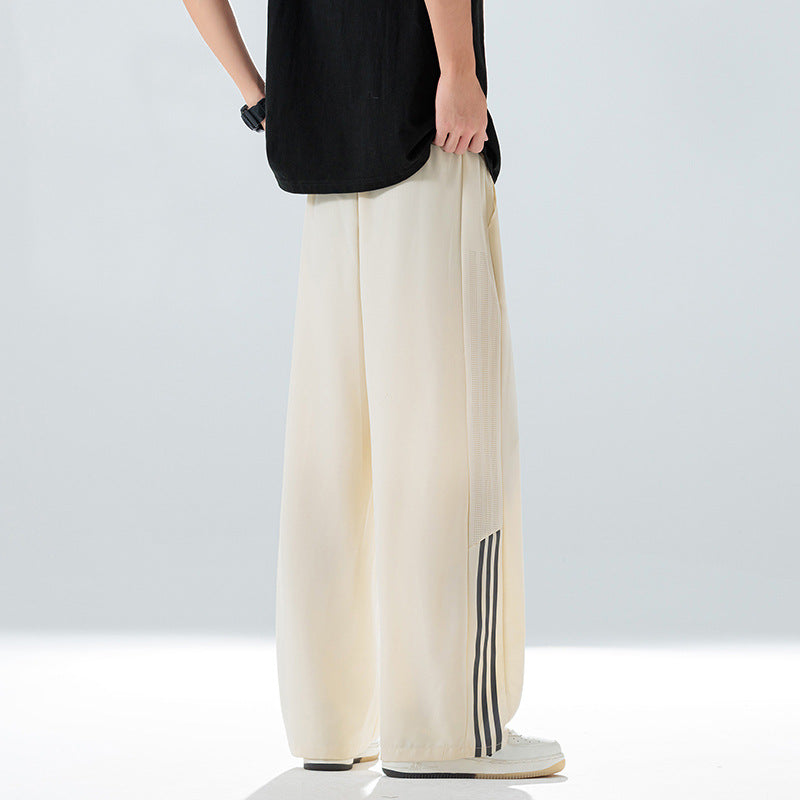 Men's sporty leisure pants with side ventilation openings