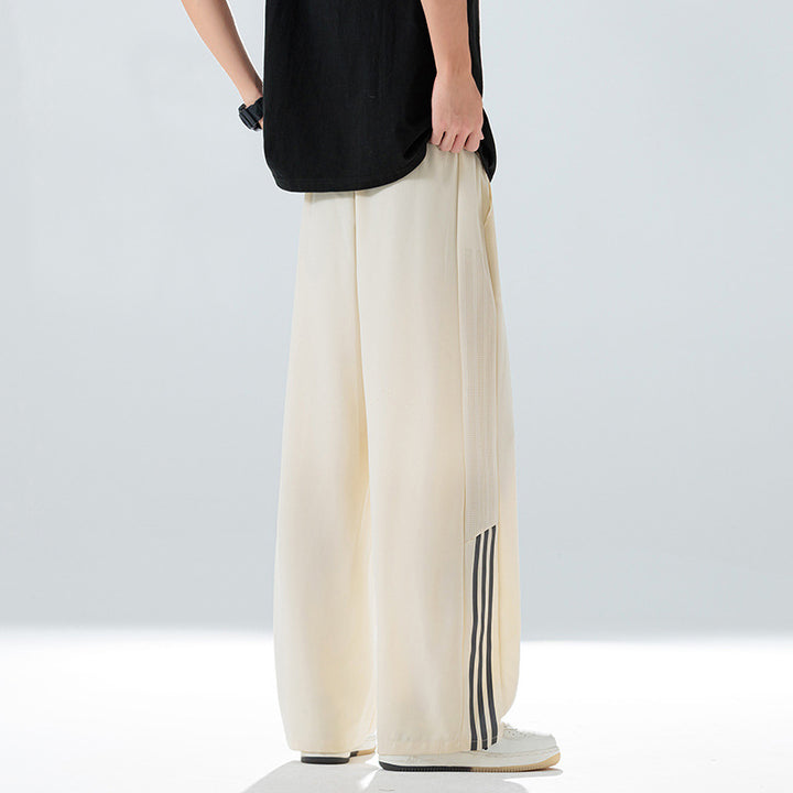 Men's sporty leisure pants with side ventilation openings