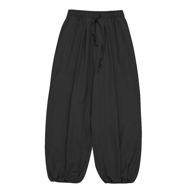 Unisex balloon pants with drawstring, elastic cuffs and relaxed fit Mune Fashion