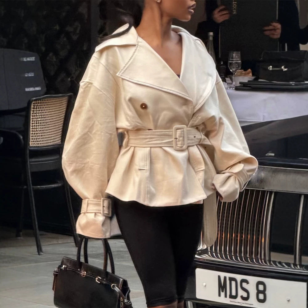 Ladies short trench coat with tailored belt, wide lapels and boxy silhouette Mune Fashion