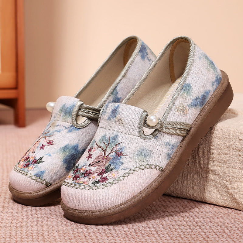 Women's embroidered slippers with pearl detail, breathable textile upper, and shock-absorbing comfort sole Mune Fashion