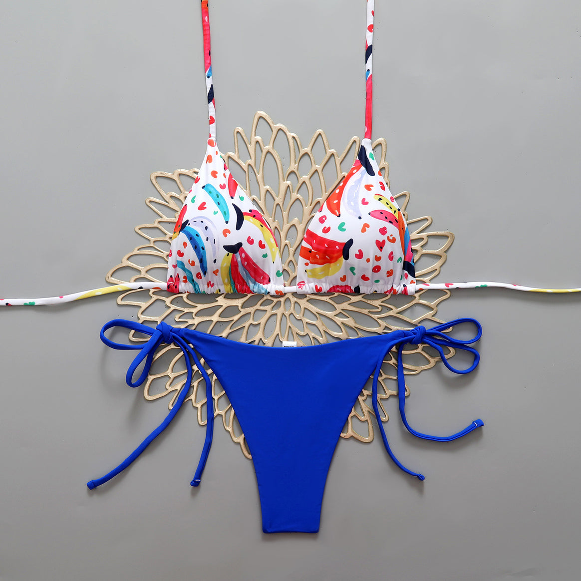 Women’s bikini set with colorful designs and adjustable side straps Mune Fashion