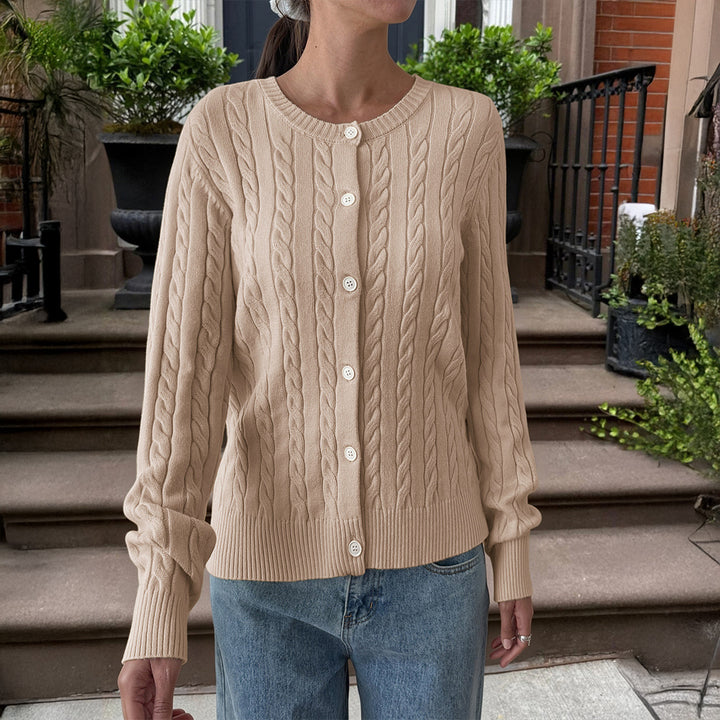 Women's cable knit cardigan with round neckline, button placket and ribbed hem Mune Fashion