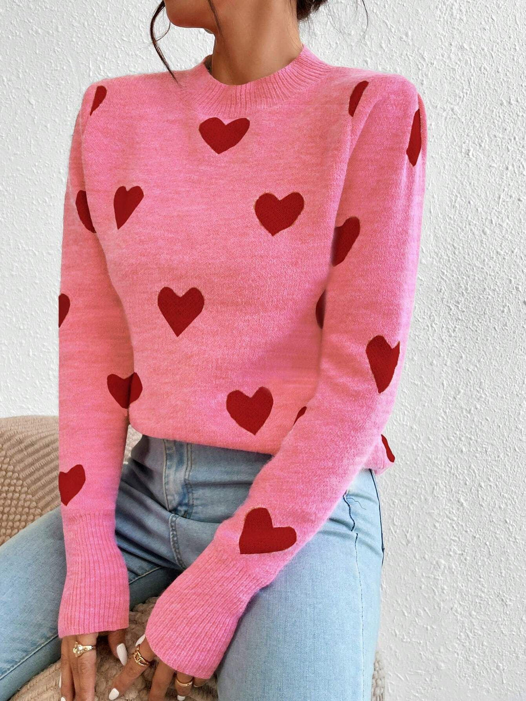 Women’s cashmere-like fine knit sweater with all-over heart pattern, round neckline and extended cuffs Mune Fashion