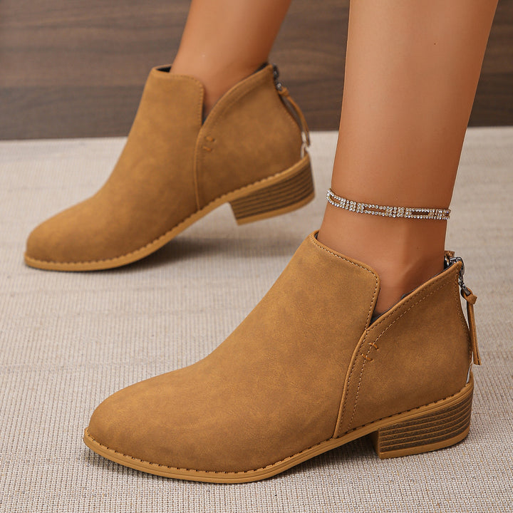 Women's fashionable short ankle boots with rear zipper, low block heel, and padded comfort insole Mune Fashion