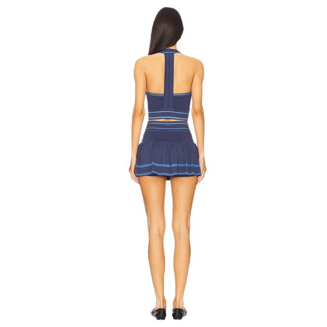 Women's knitted two-piece set with narrow straps, fitted crop top and pleated mini skirt in tennis style Mune Fashion