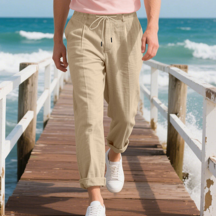 Men's beach-suitable linen blend lounge pants with elastic drawstring, subtle pleat, and rolled ankle hem Mune Fashion