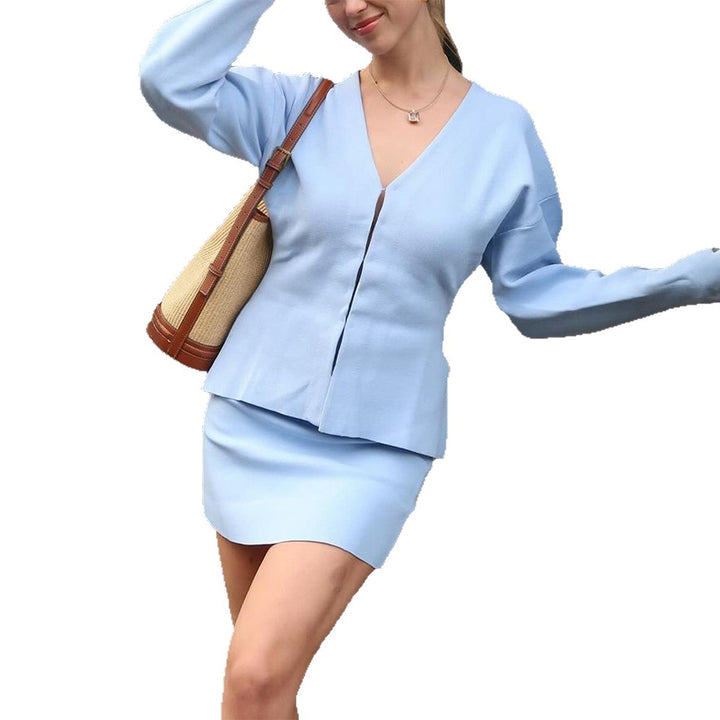 Ladies fitted cardigan with V-neck, puff sleeves and side slits Mune Fashion
