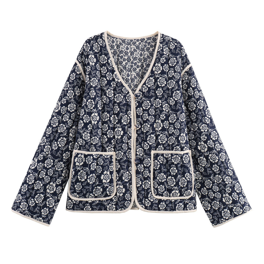 Ladies quilted jacket with floral allover, V-neck, contrast piping and patch pockets Mune Fashion