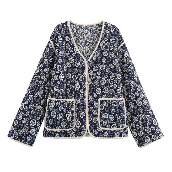 Ladies quilted jacket with floral allover, V-neck, contrast piping and patch pockets Mune Fashion