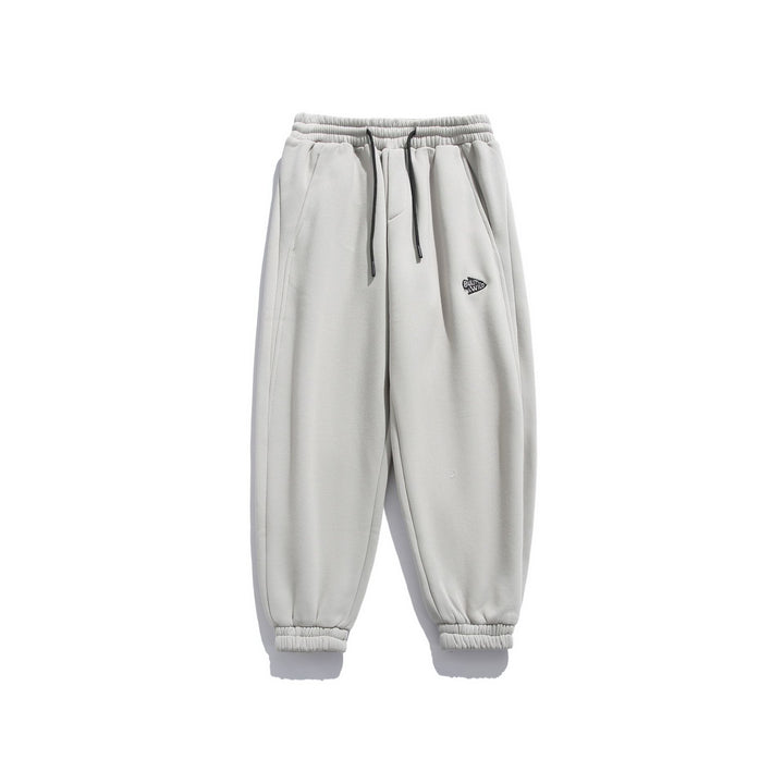Unisex locker cut fleece jogging pants with drawstring, elastic hem and side pockets Mune Fashion