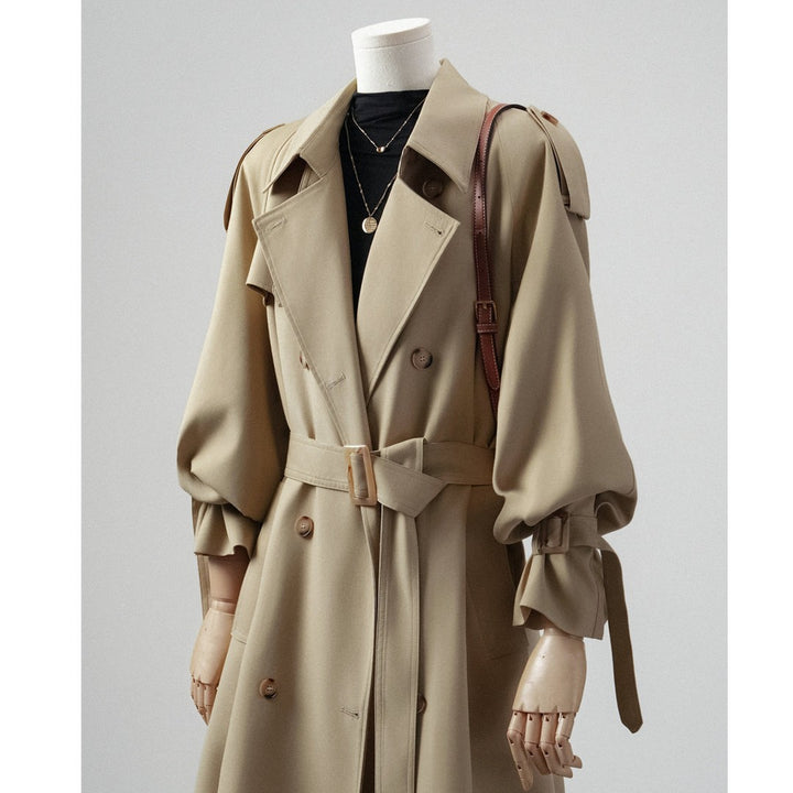 Women's trench coat with balloon sleeves, double-breasted cut and waist belt Mune Fashion